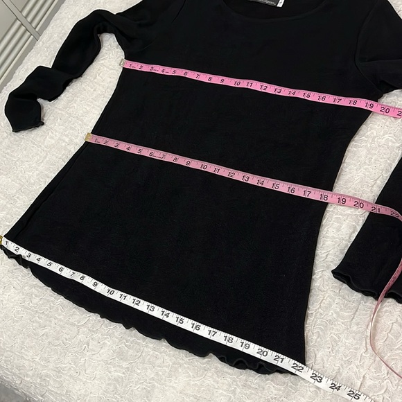 Travel Elegance Long Sleeve Black Top.
Size Large - Picture 9 of 15